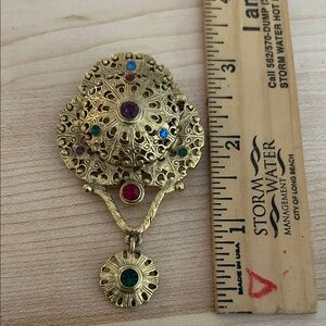 Vintage OAJC Gold-Tone Brooch with Multicolor Stone 
Accents